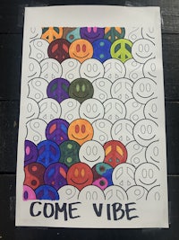 Poster print colored by people checking out Society Music's pop-up shop. Poster print design is included Trippy Adult Coloring Book.